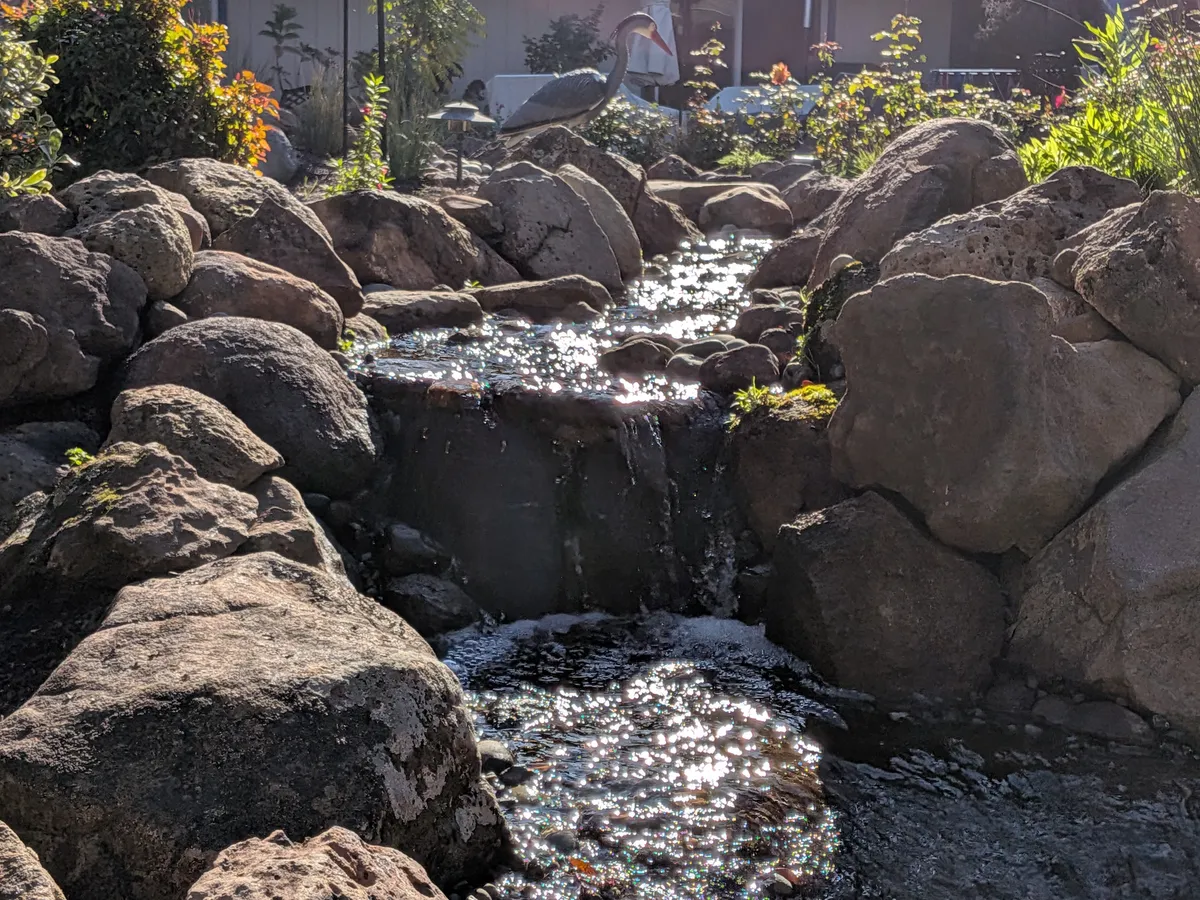 Lava Rock Courtyard Cascade landscaping project in San Jose, CA