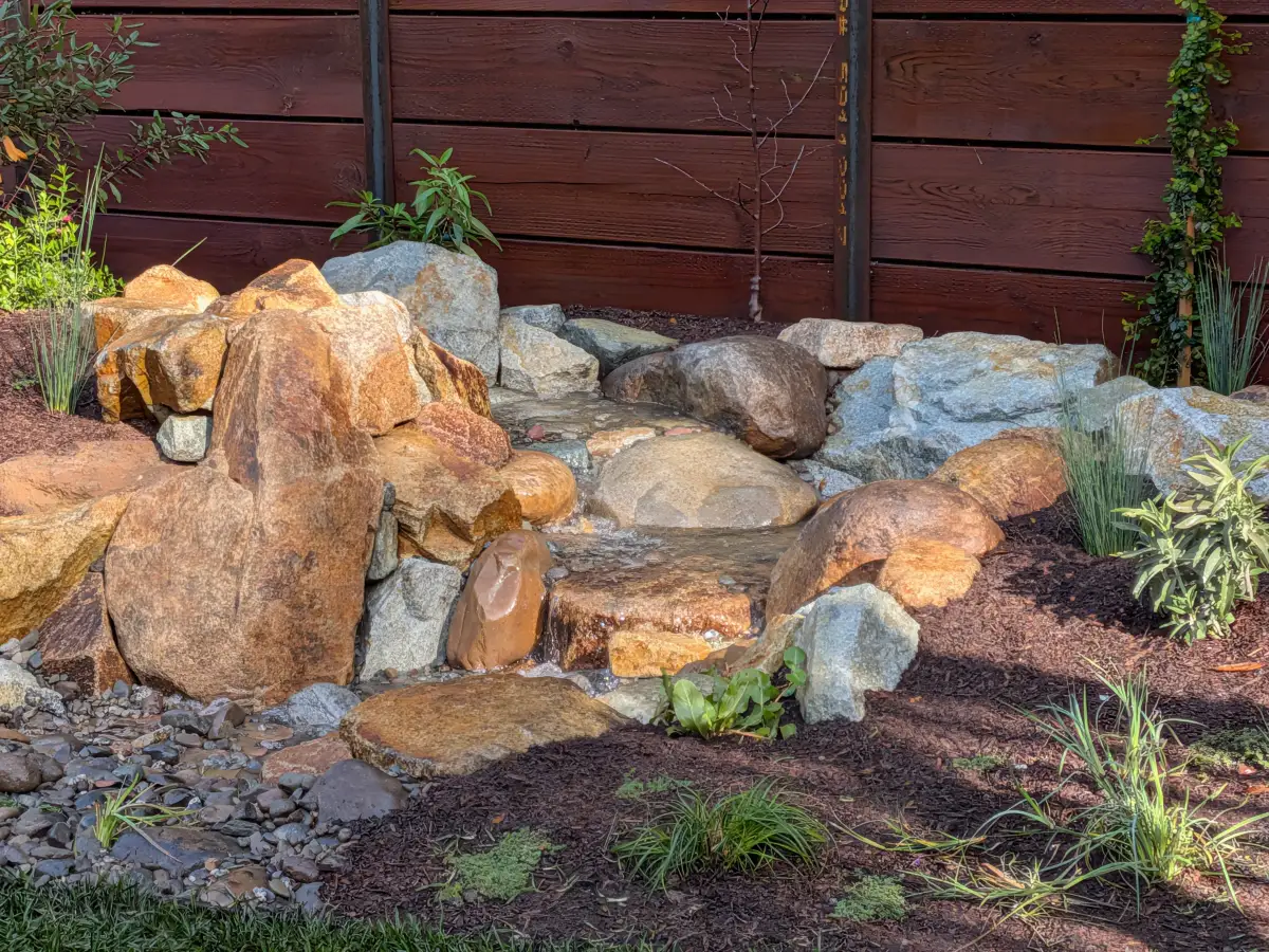 A pondless stream and waterfall with a hidden gravel reservoir